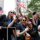 Players celebrate the US women’s side winning a fourth World Cup title.